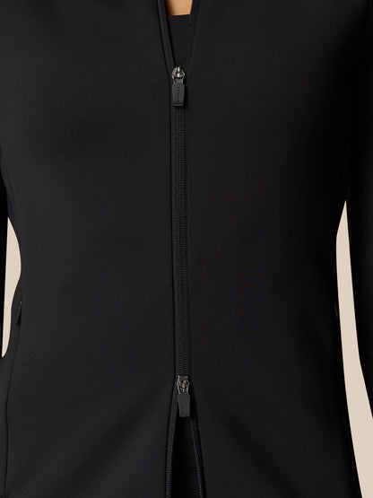 Model wearing a black Zone Training Top full zip jacket with front zipper in a sleek athletic fit