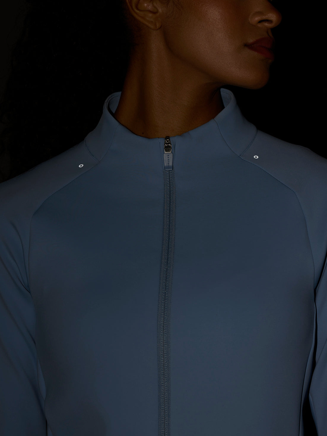 Rear angle of Zone Training Top sky blue highlighting breathable perforations and seam lines