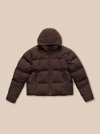 Rear view of brown Quilts Lifestyle Jacket with padded hood and Castore branding on the hood
