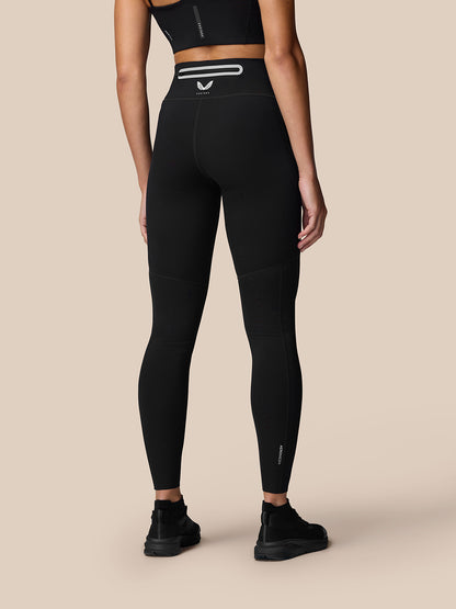 Rear view of black Apex Training Leggings showing high waist and reflective branding along calf