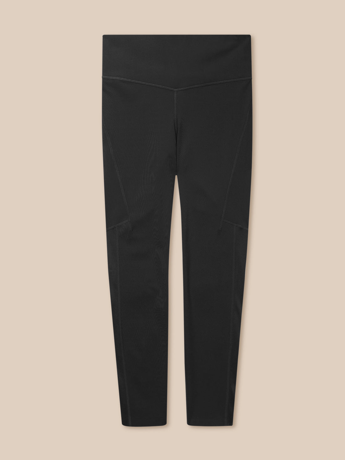Back view of black high waisted training leggings with contoured seams