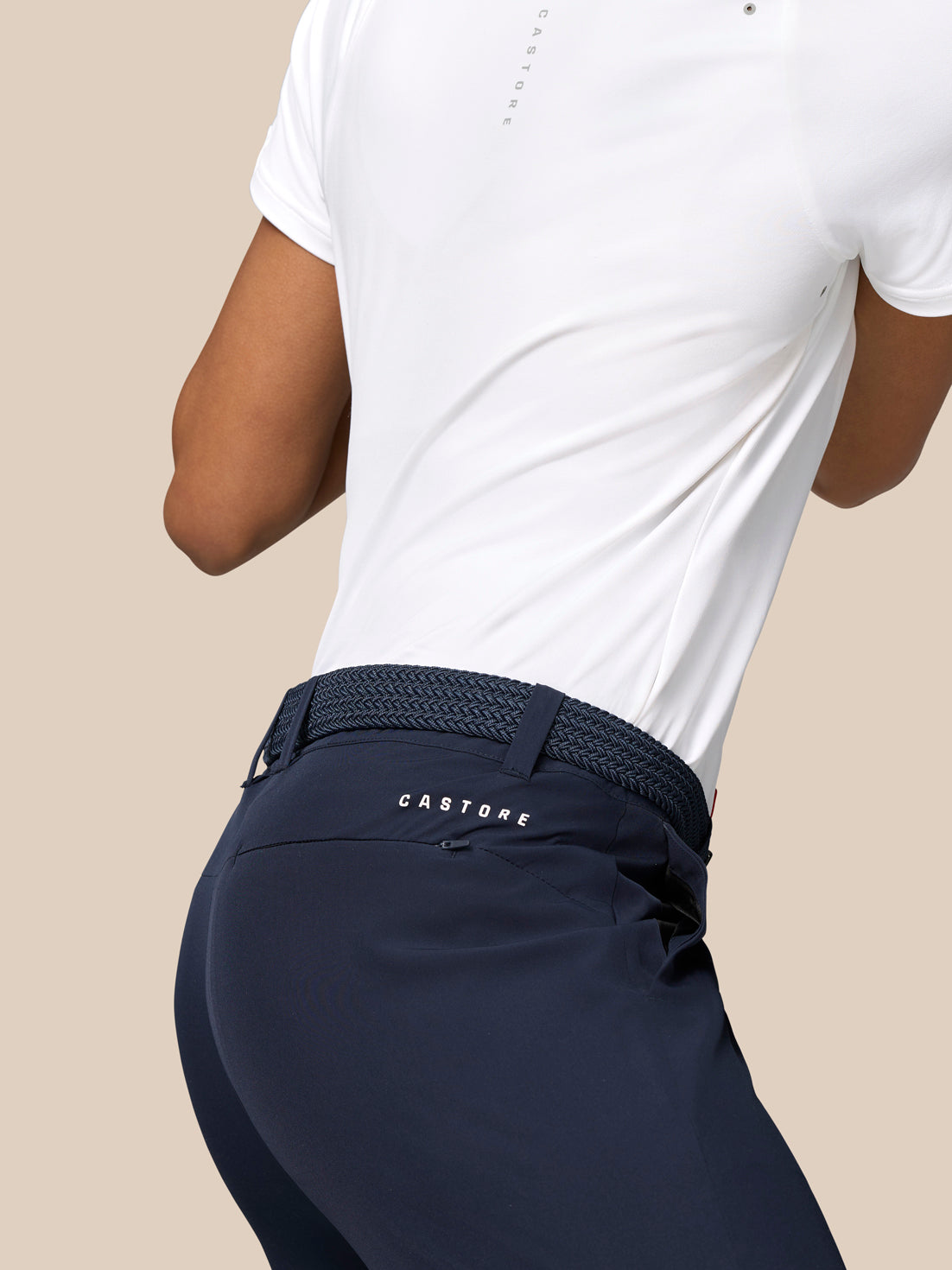 Waist and belt area of navy Club Golf Trousers featuring ProTek branding on the fabric