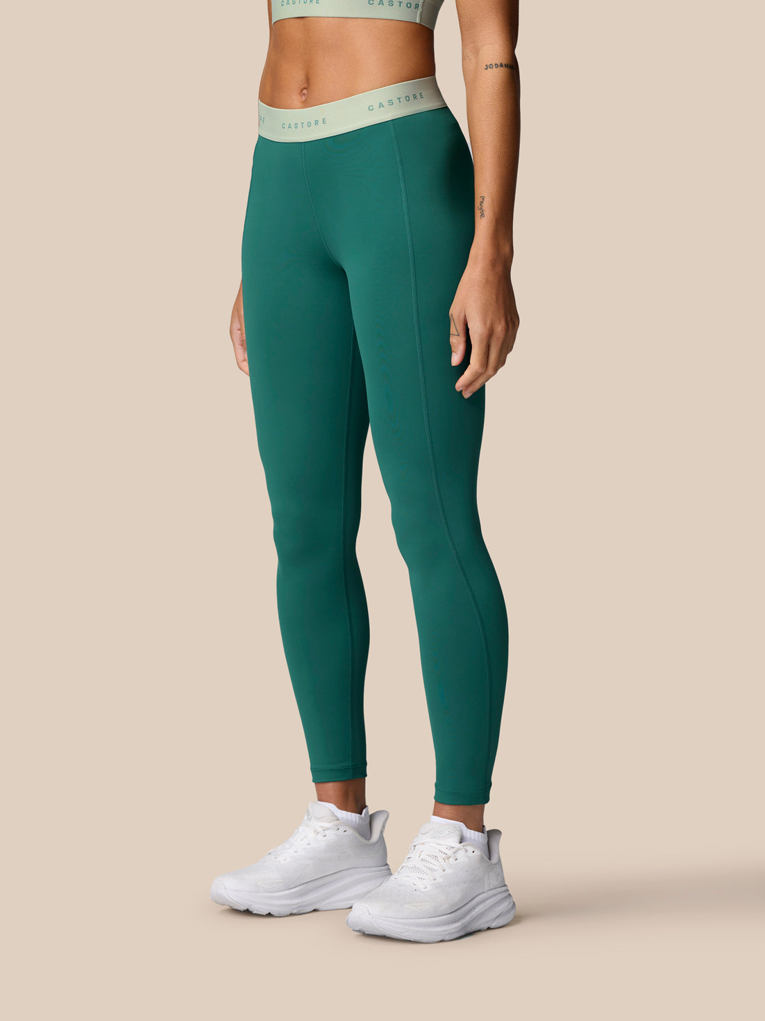Adapt Training Leggings in seafoam worn by a model front view showing full length fit and mint wicking waistband.