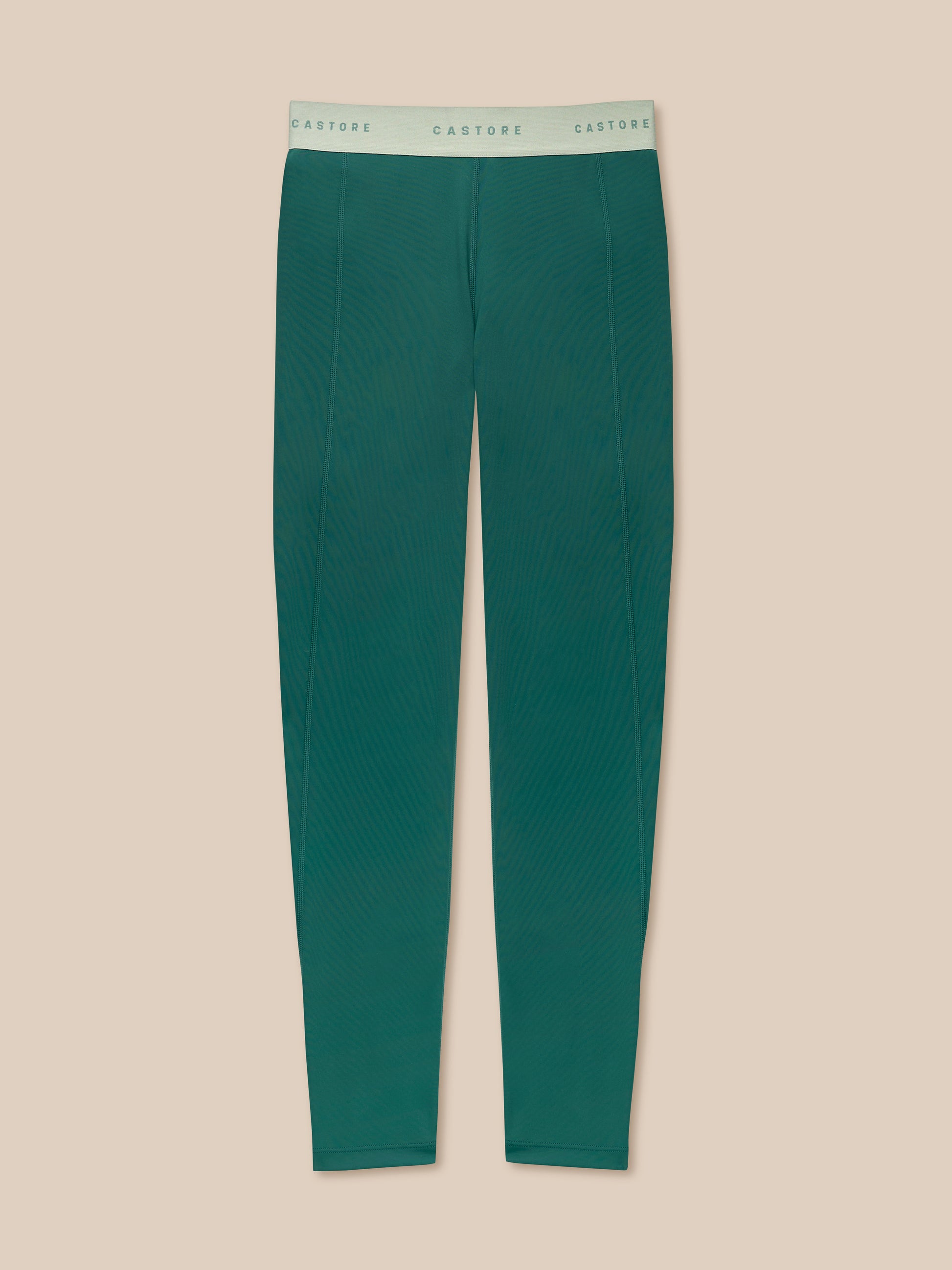 Back view of seafoam Adapt Training Leggings on a model showing the waistband and leg seams.
