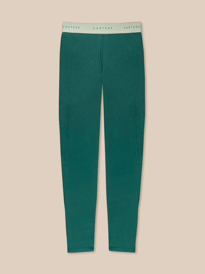 Back view of seafoam Adapt Training Leggings on a model showing the waistband and leg seams.