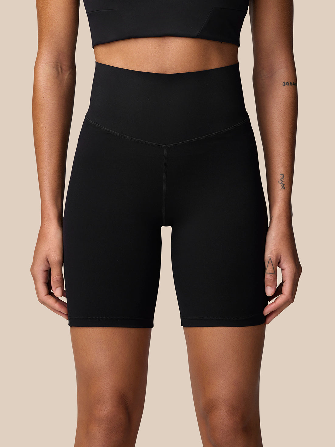 Back view of black Apex Training Shorts with high waistband and reflective branding