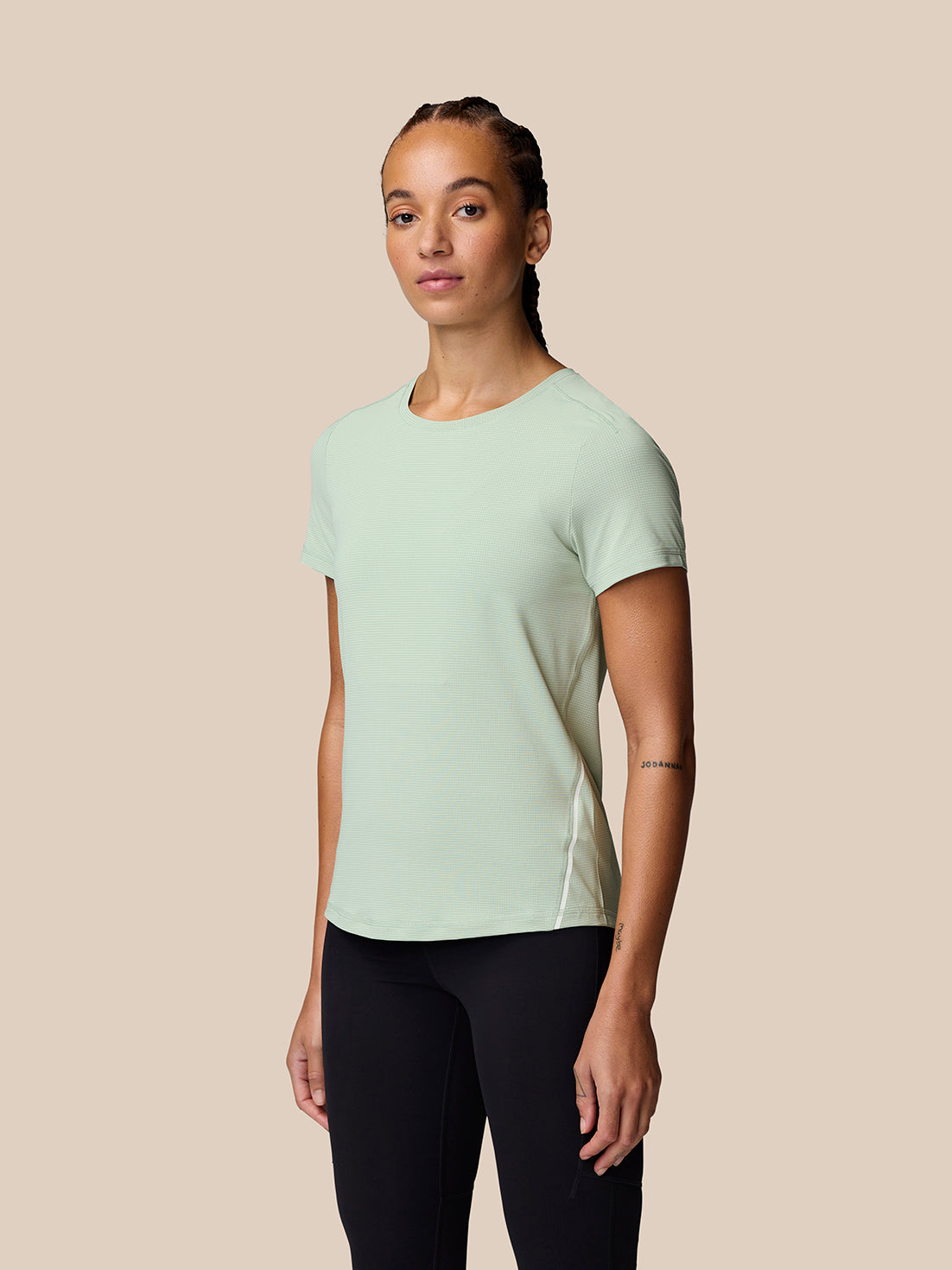 Model wearing Apex Training T Shirt Sage mint green tee with crew neck front view against a neutral background.