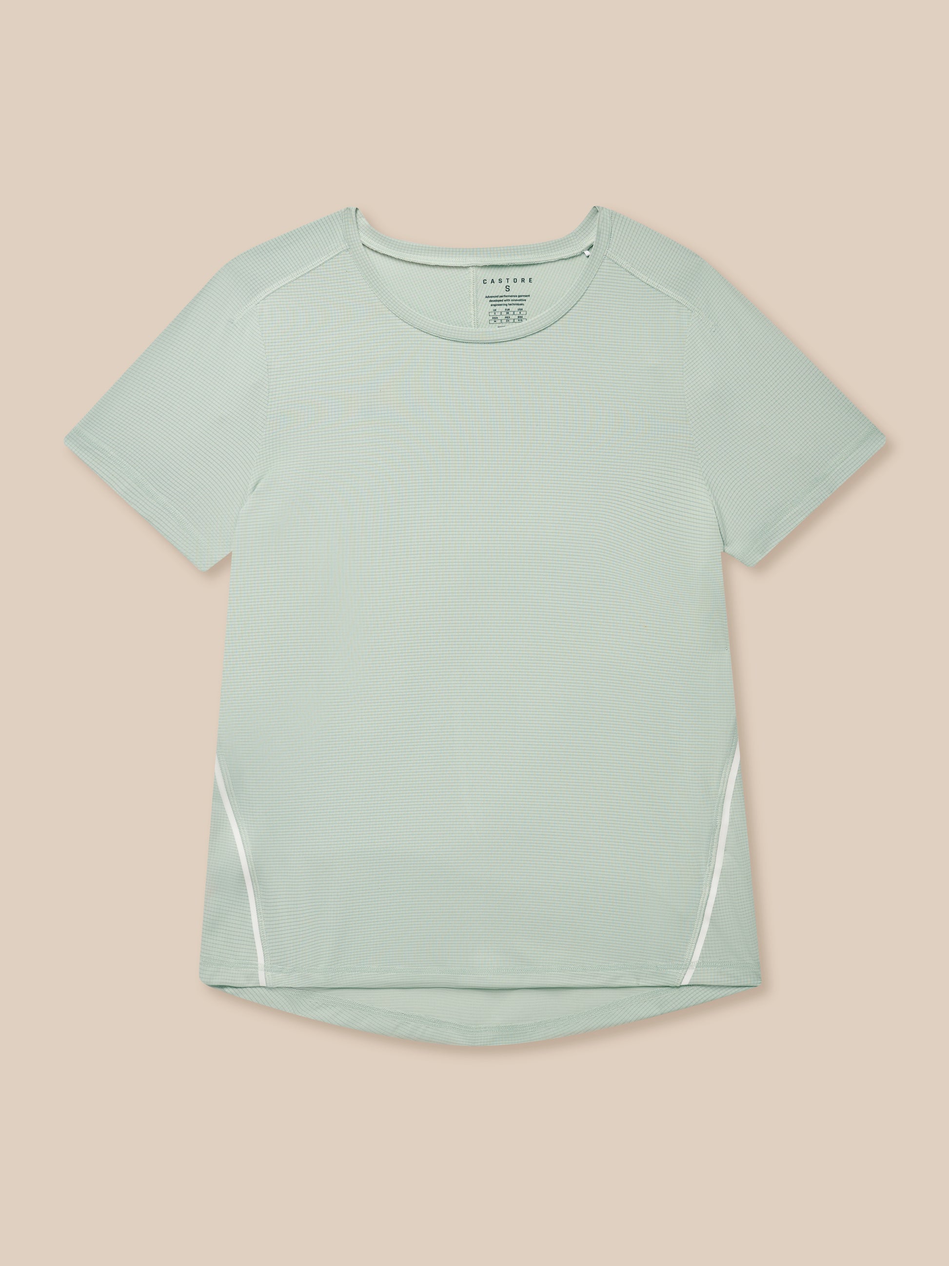 Close up of sage Apex Training T-Shirt showing crew neck short sleeves and curved hem detail