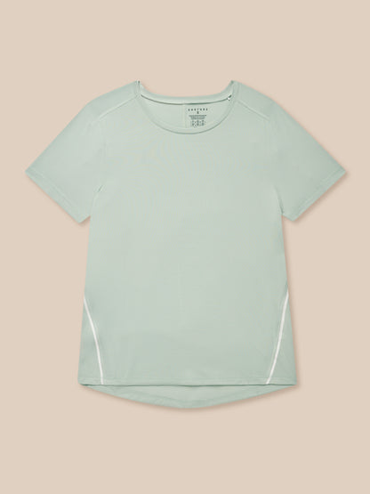 Close up of sage Apex Training T-Shirt showing crew neck short sleeves and curved hem detail