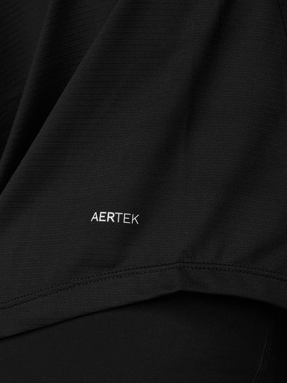 Close up of black fabric with AERTEK logo and subtle ribbed texture