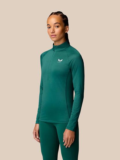 Model in seafoam Adapt Training half zip top with standing collar and long sleeves