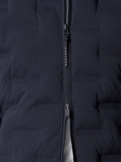 Close-up of navy front zipper on Pinnacle Hybrid Gilet with Castore pull