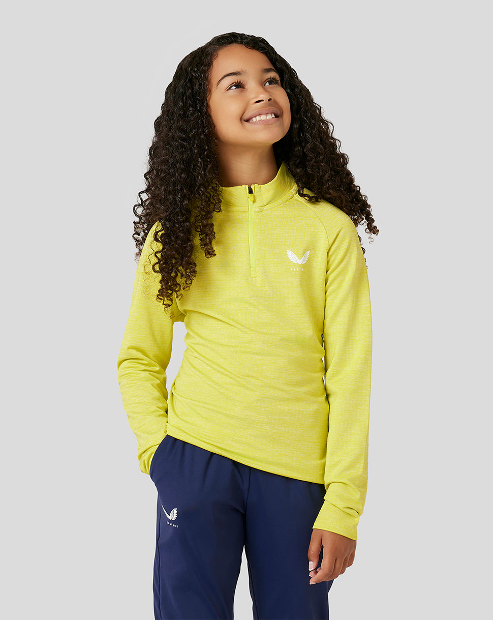 Smiling girl wearing lime Citrus Junior Standard 1/4 Zip front view