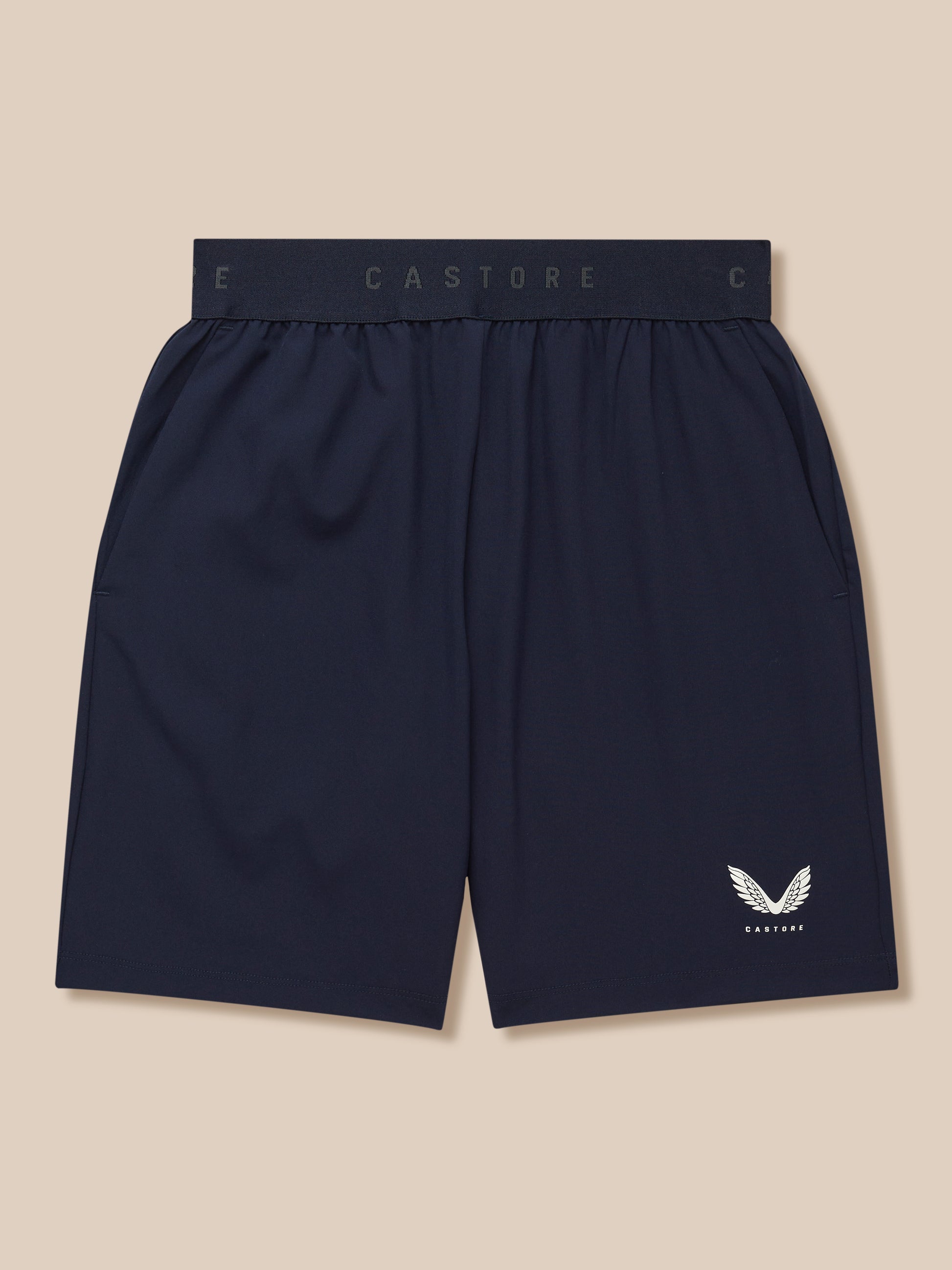 Navy Junior Adapt Woven Shorts with elastic waistband and Castore branding, white wing logo on the leg.