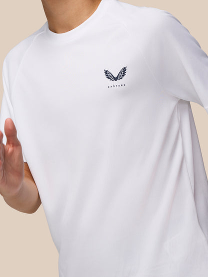 Front view of the white Junior Adapt Training T Shirt showing Castore logo on the left chest