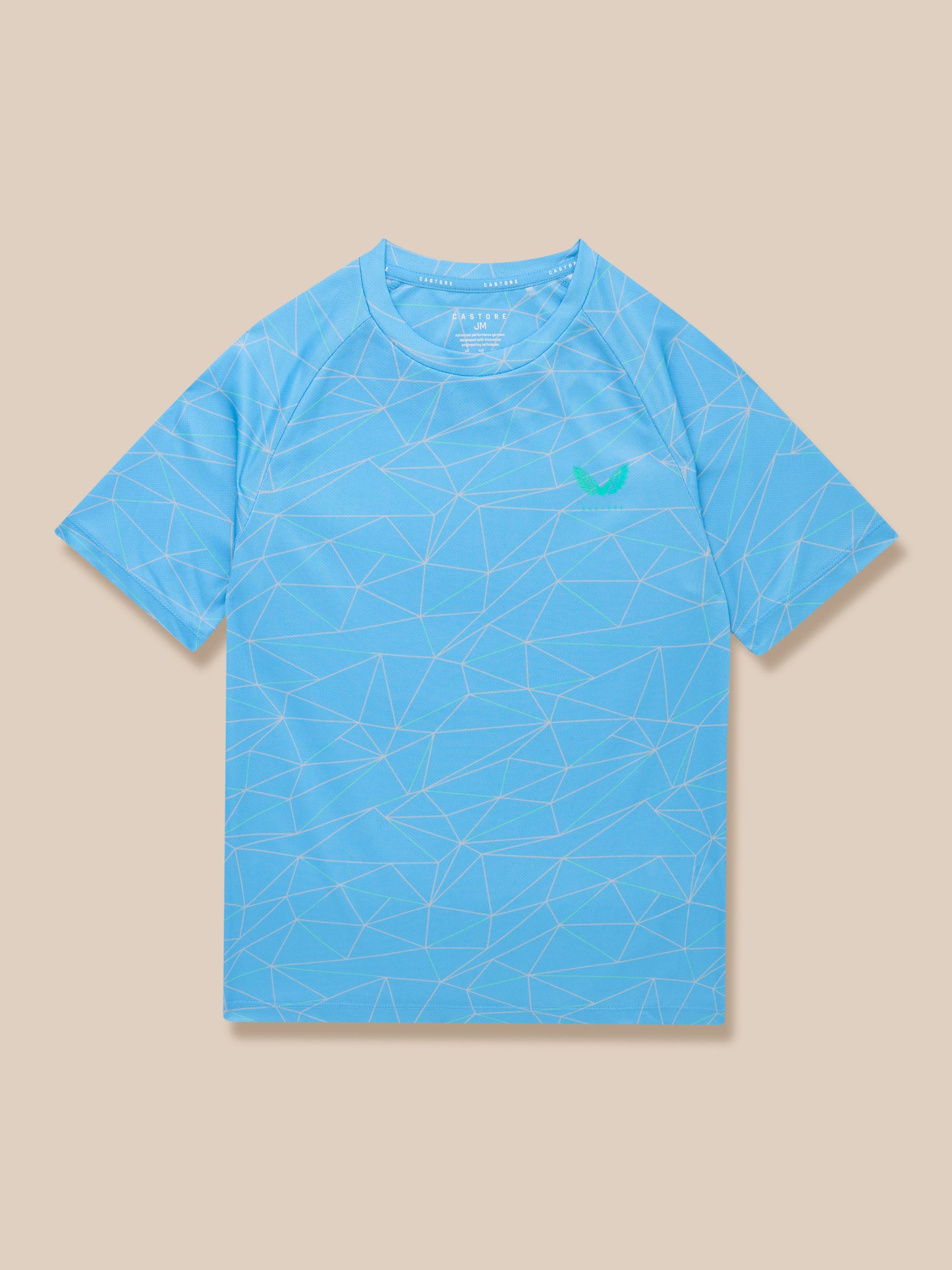 Junior blue allover print short sleeve T shirt with a green Castore logo on the chest.