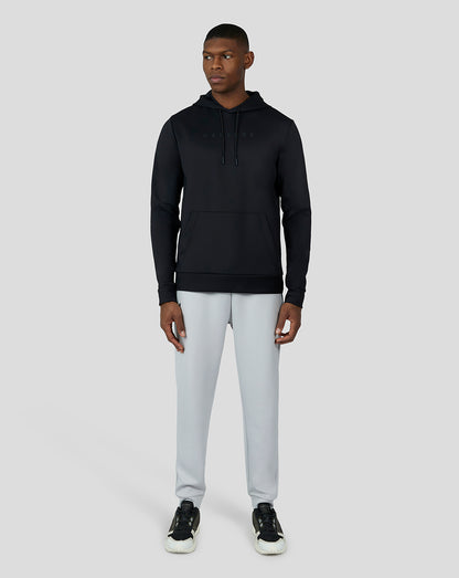 Front view of a man wearing a black Flex Hoodie 3.0 with drawstring hood and athletic fit