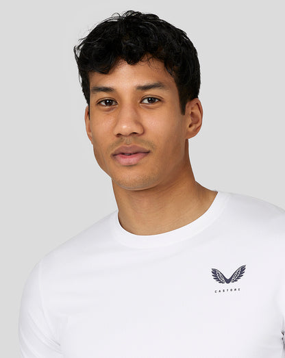 Front view of a man in a white performance short sleeve T shirt with crew neck and Castore logo on the left chest