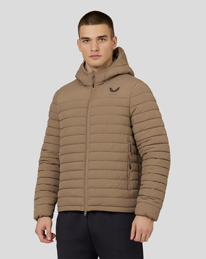 Male model wearing mushroom hooded puffer jacket with zip front and horizontal quilted panels, left chest logo
