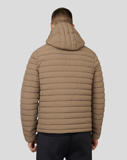 Back view of a beige mushroom hooded puffer jacket on a model with quilted panels