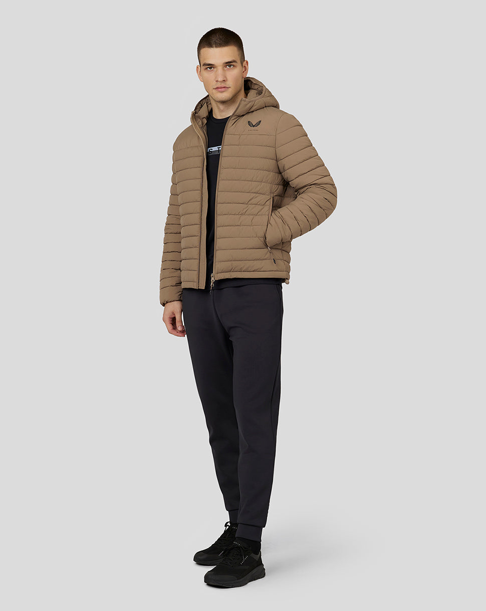 Male model wearing mushroom hooded puffer jacket with hood up