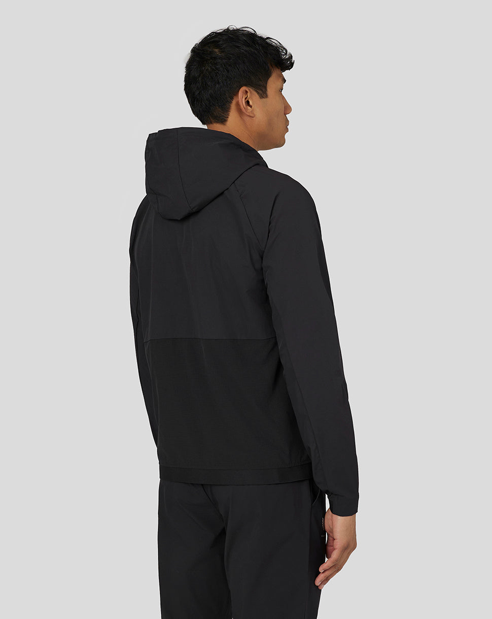 Back view of black lightweight woven jacket with hood and elastic hem