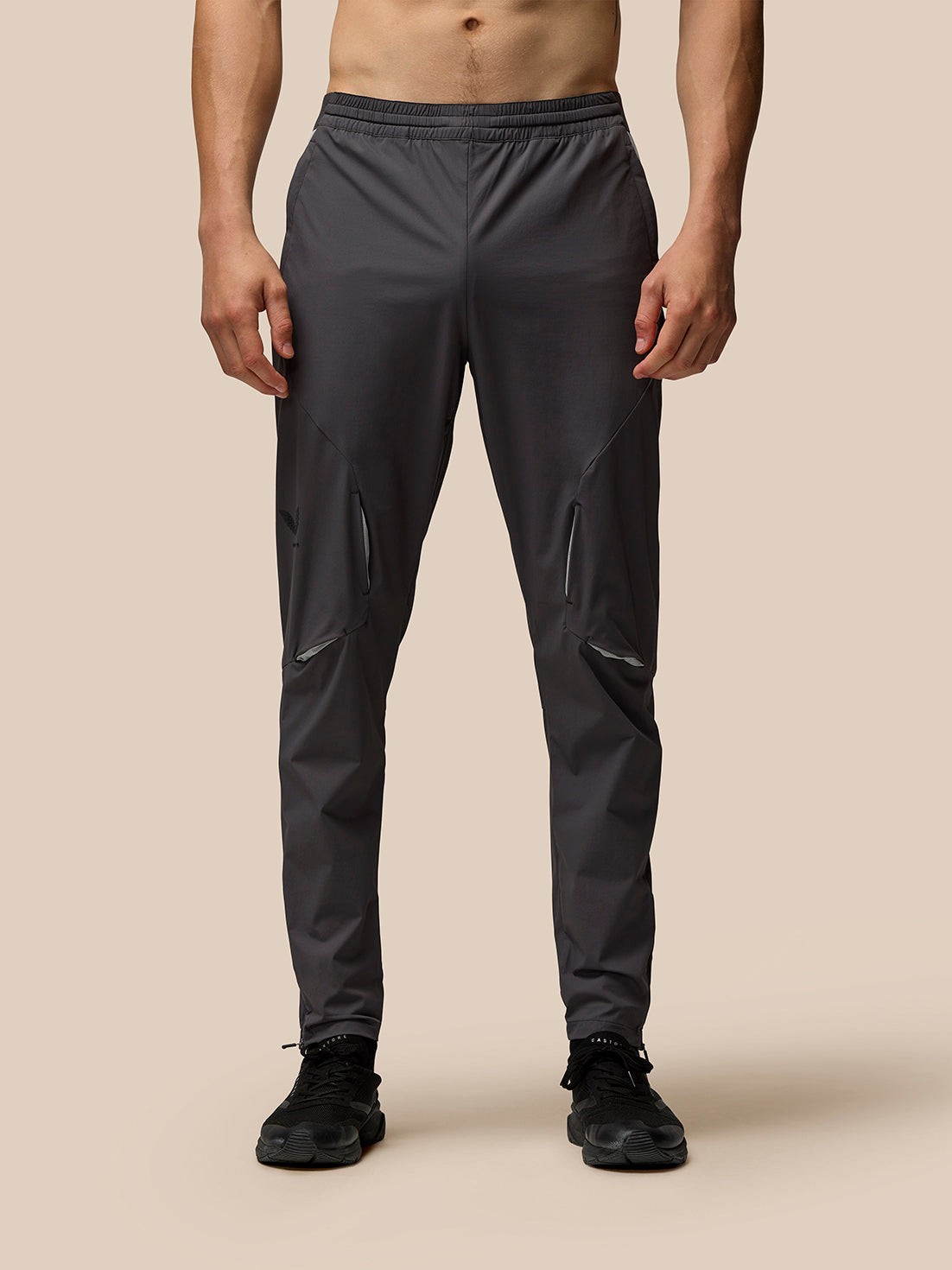 Grey Flex training joggers with panelled design zip cuffs, zipped side pockets and Castore branding on leg