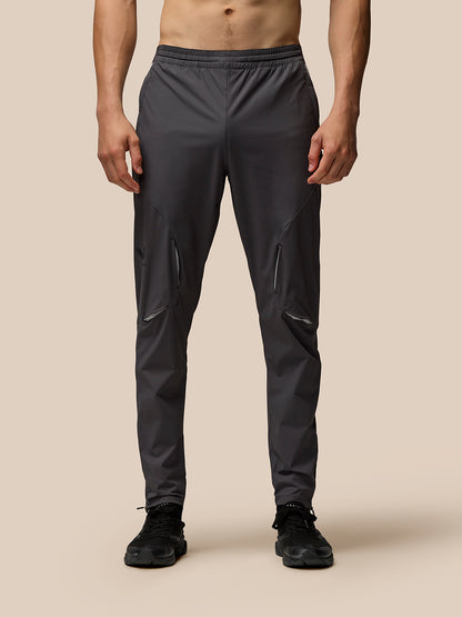 Grey Flex training joggers with panelled design zip cuffs, zipped side pockets and Castore branding on leg