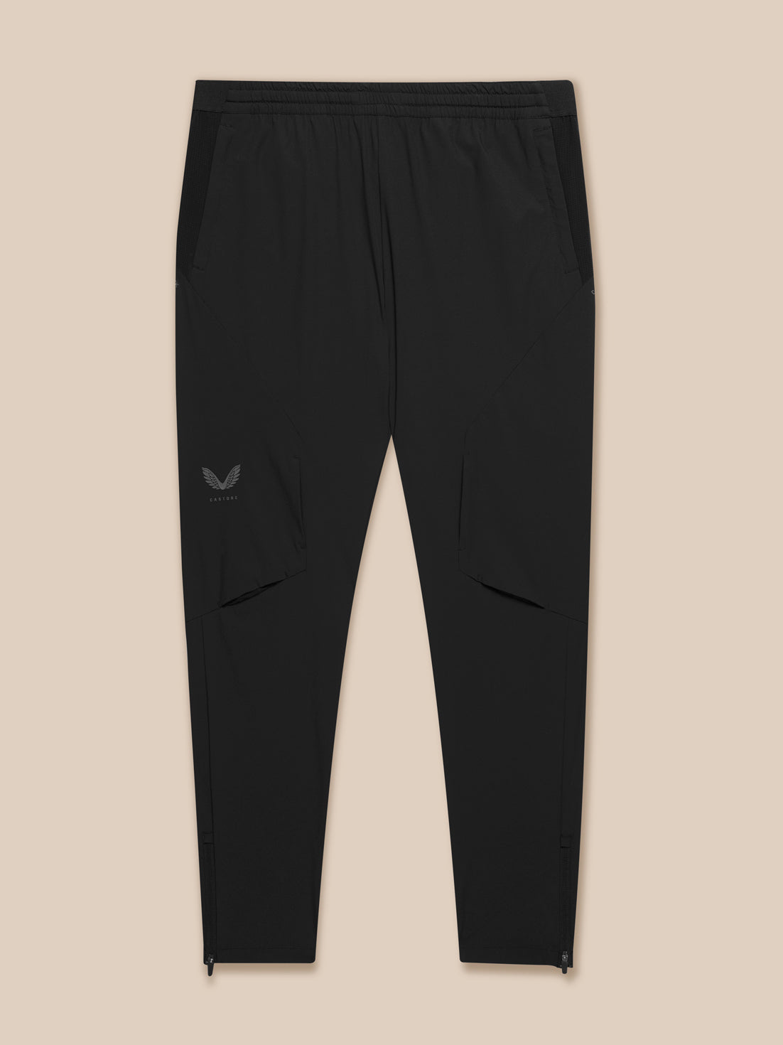 Flat lay of black Flex Training Joggers showing cuff zip details and Castore logo on the leg