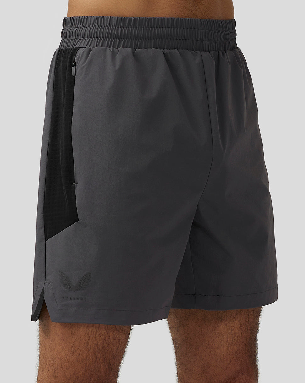 Close up of Apex Training Shorts gunmetal highlighting elastic waistband and zipped side pocket