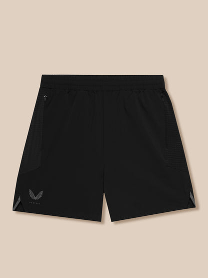 Back view of black Apex Training Shorts with elastic waistband side pocket zips and Castore logo at the hem