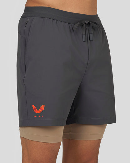Gunmetal Flow Training Shorts with drawstring waistband and side pocket, branding from Castore and Aertek visible.