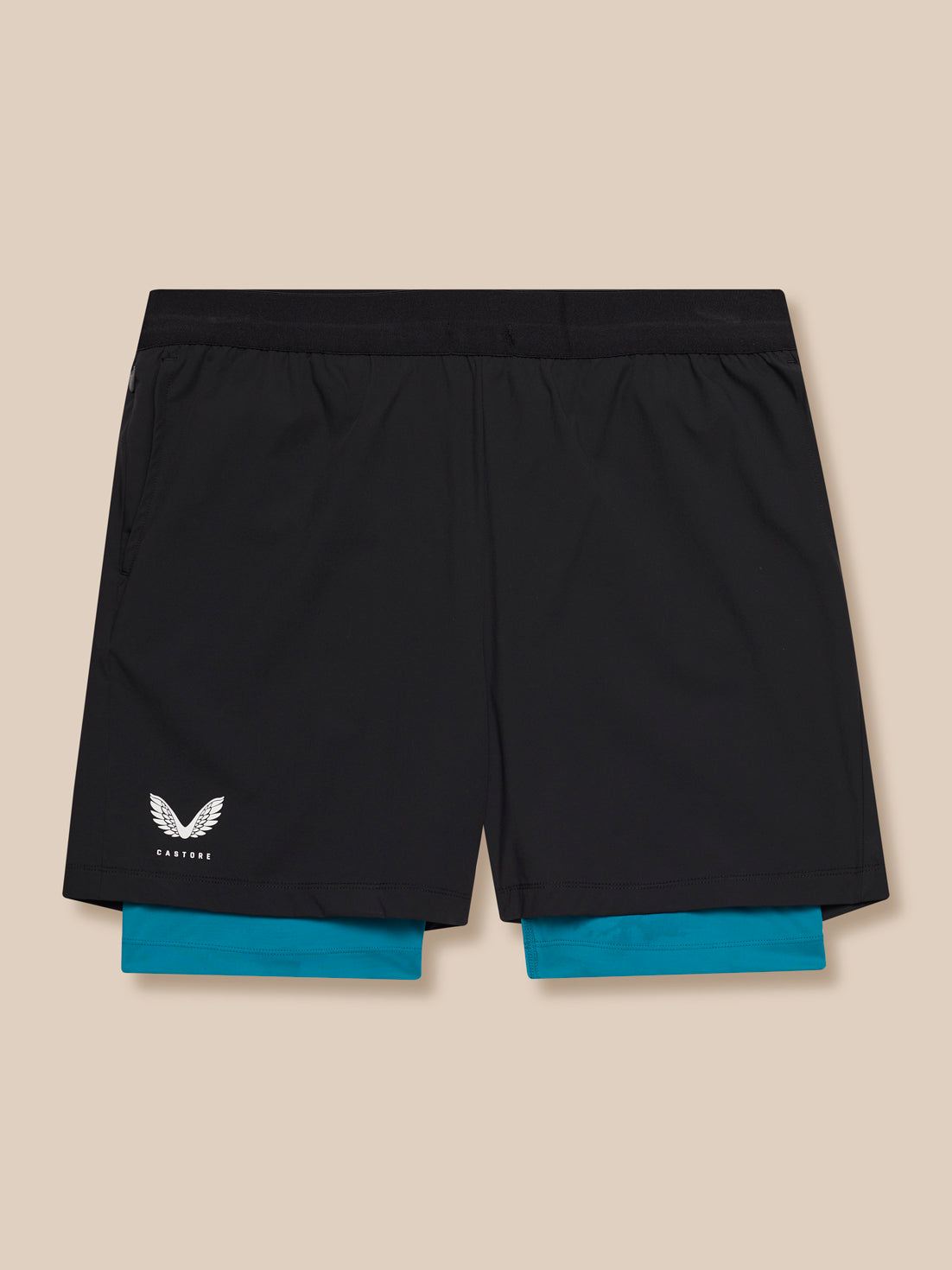 Back view of Flow Training Shorts in black with teal underlayer peeking from the hem and Castore logo on the left leg