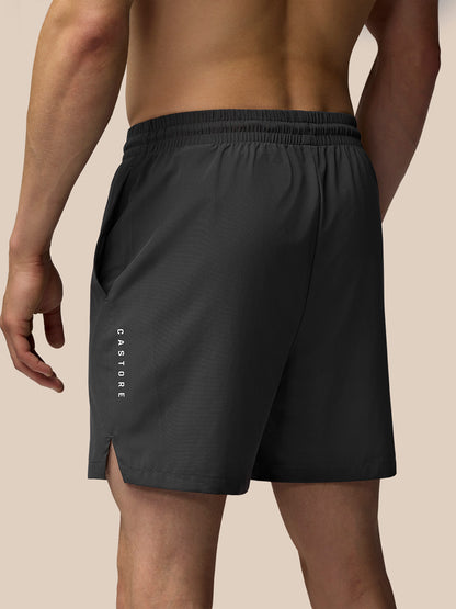 Grey Adapt Training 7 inch shorts side view with elastic waistband and Castore logo on the left thigh.