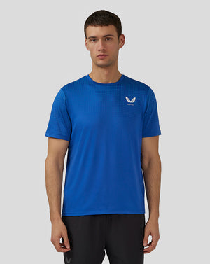 Front view of royal blue Flow Short Sleeve Knit T-Shirt with crew neck and small Castore logo on the chest.