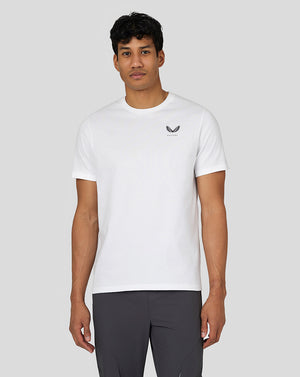 Male model wearing white Men’s Flex Short Sleeve T Shirt with a small Castore logo on the left chest.