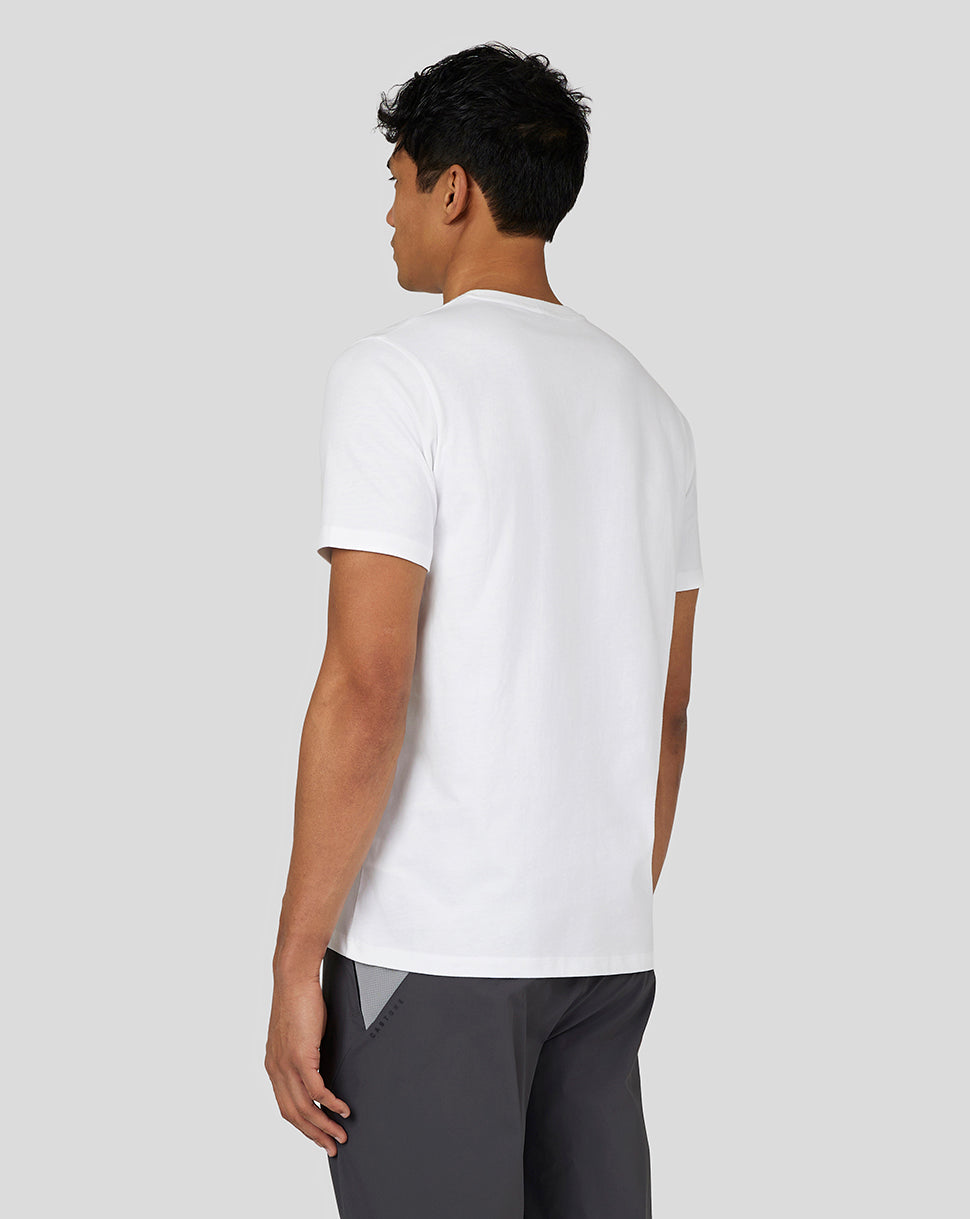 Back view of a male model wearing a white Men’s Flex Short Sleeve T Shirt.