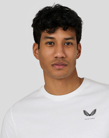 Close-up of a man wearing a white Castore Men’s Flex Short Sleeve T Shirt with a small left chest logo