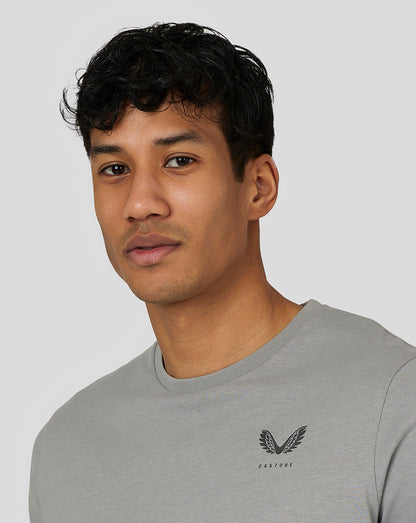 Male model wearing steel grey Castore Men’s Flex Short Sleeve T Shirt with left chest logo