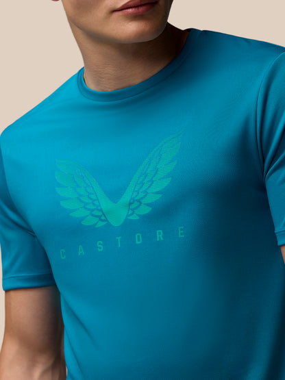 Close-up of turquoise Adapt Training T-Shirt with a wing logo on the chest
