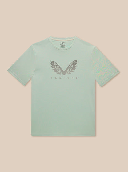 Front view of green Adapt Short Sleeve Graphic T Shirt with Castore wings logo on the chest