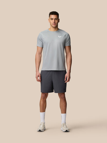 Male model wearing Adapt Training T-Shirt in Mid Grey with Castore logo on the chest and upper back