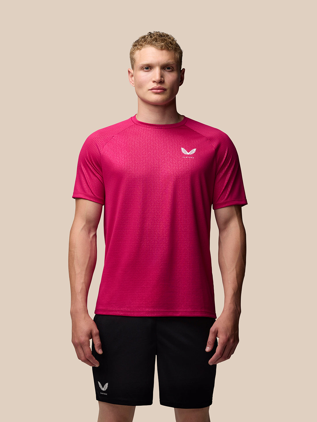 Pink Adapt Training T-Shirt with geometric pattern and AerTek branding on chest and lower back