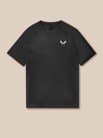 Adapt Training T-Shirt in black with white Castore logo on the chest and subtle textured pattern