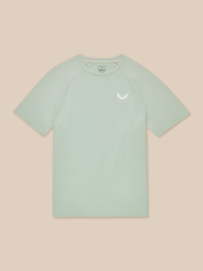 Adapt Training T-Shirt in pale green with geometric print and Castore logo on the left chest