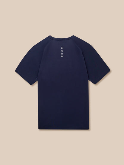 Midnight Navy Adapt Training T-Shirt back view with vertical Castore branding along the upper back