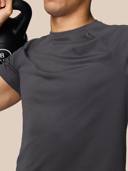 Close-up of the chest area of the gunmetal Adapt Short Sleeve T-Shirt showing a small Castore logo