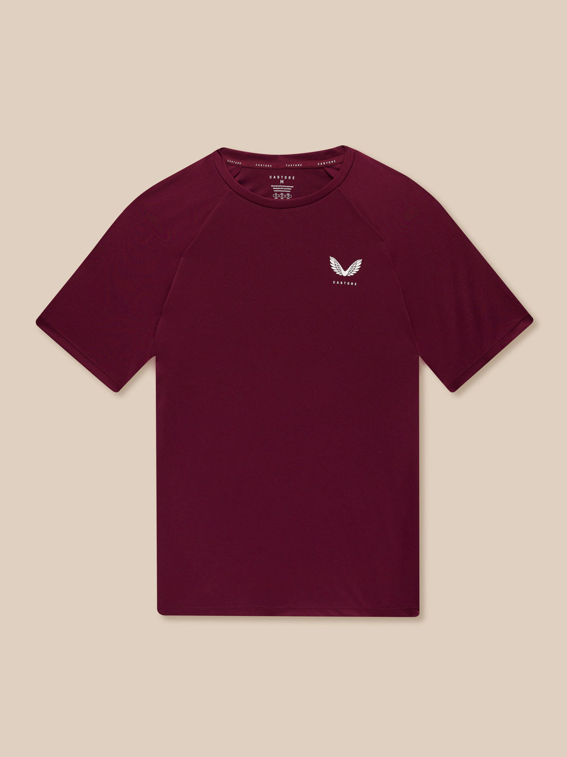 Front view of burgundy Adapt Training T Shirt showing small Castore logo on the left chest