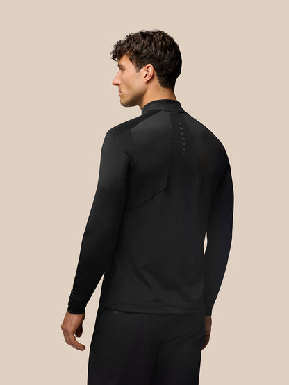 Back view of black Apex Training top with vertical branding along the spine