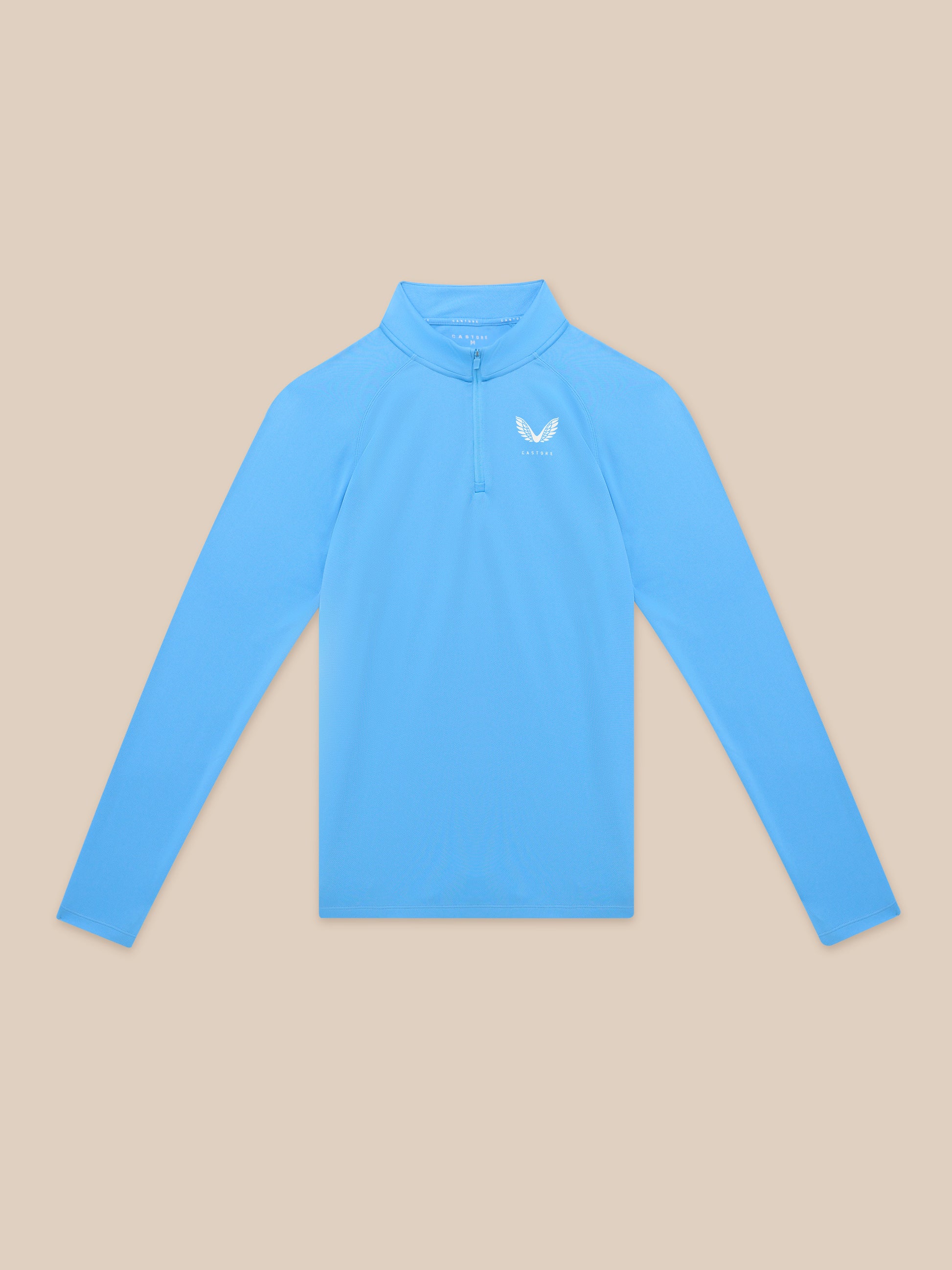 Adapt Training 1/4 Zip Top in cool blue with white Castore logo on left chest.